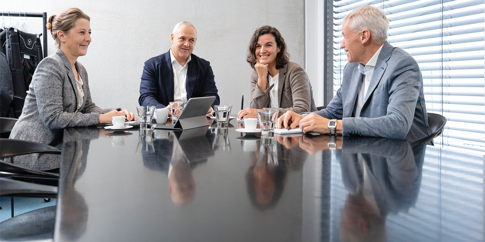 Geschäftsleitung am Besprechungstisch