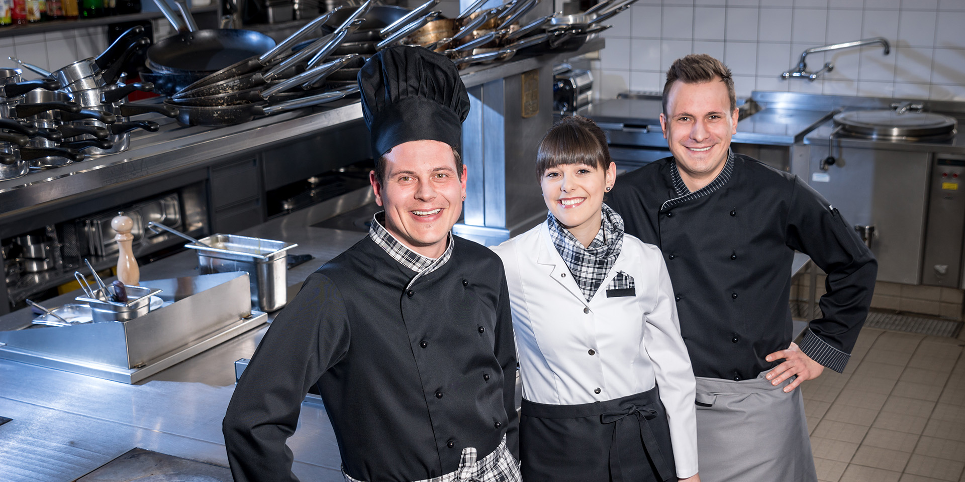 Drei Küchenangestellte